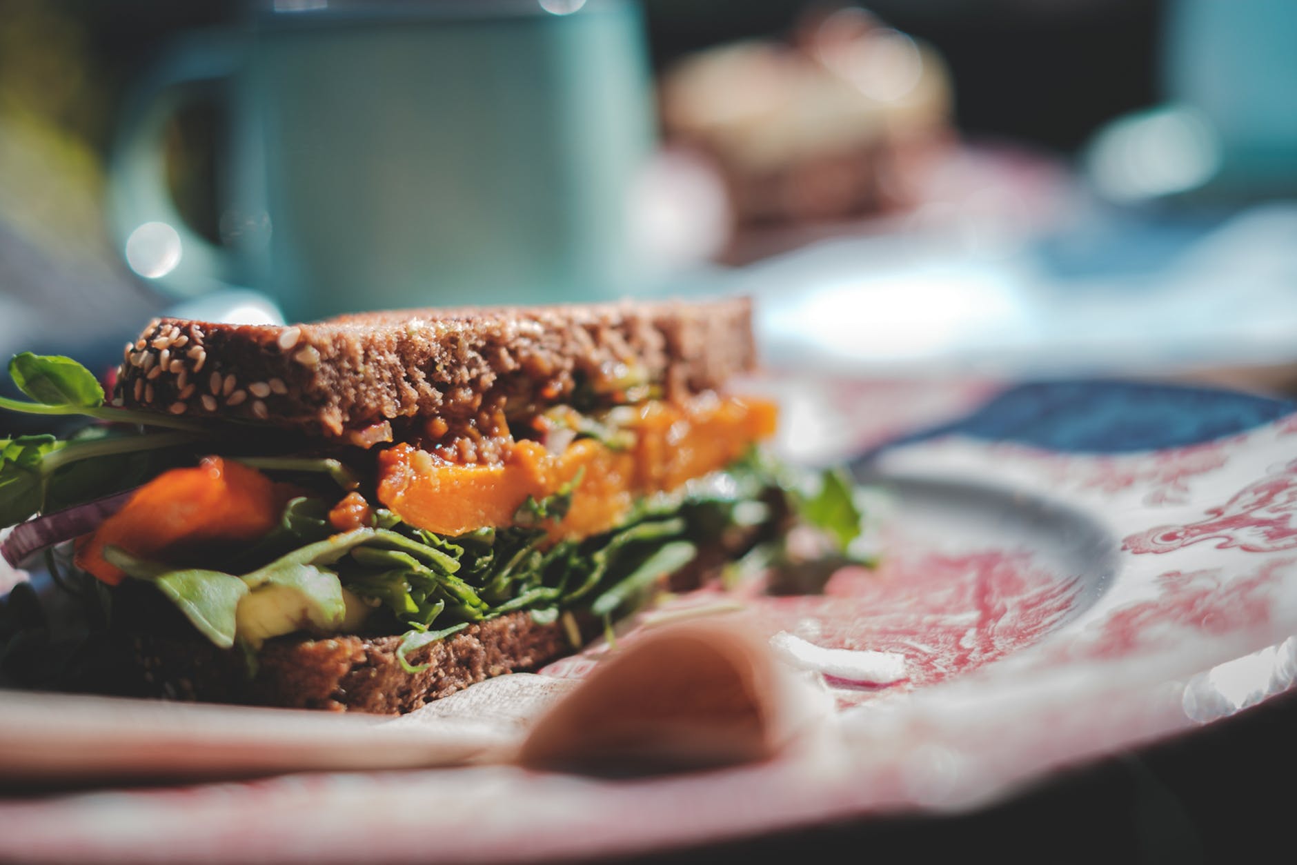 delicious vegetarian sandwich with mixed leaves and tomatoes